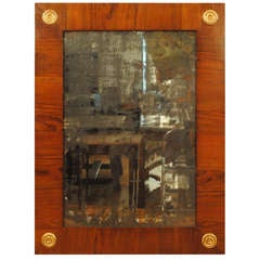 A Spanish Neoclassic, Mid 19th Century, Walnut and Giltwood Mirror