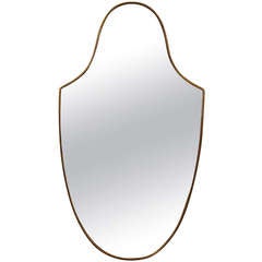 An Italian Art Deco Brass Mirror