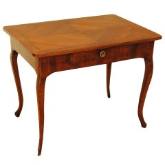 An Italian Rococo Period Walnut and Walnut Veneer 1-Drawer Side Table