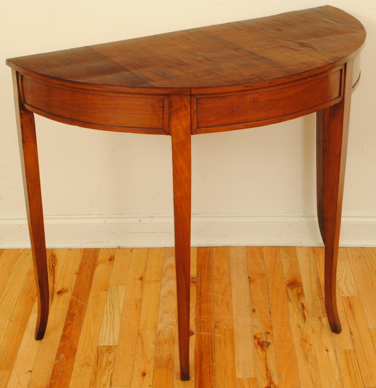 A Pair of Early 19th Century Neoclassical Neapolitan Walnut Demilune Consoles