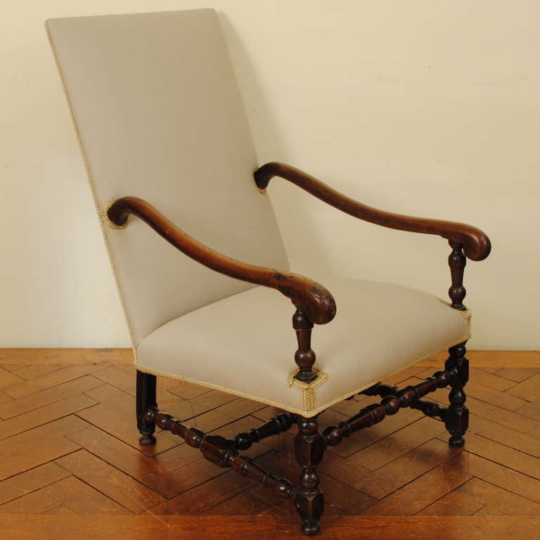 A Highly Specialized Early 18th Century Walnut and Upholstered Fauteuil