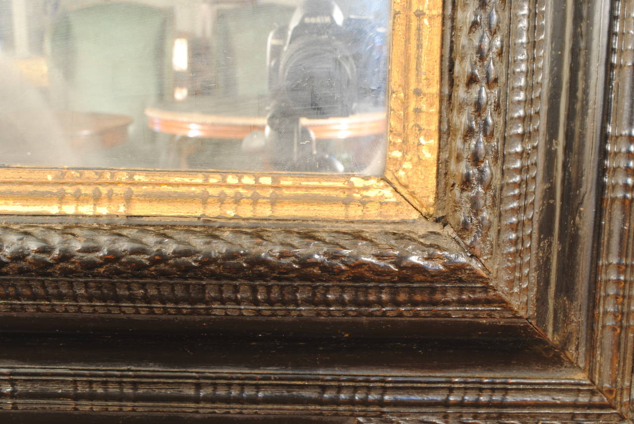 Dutch Ebonized and Giltwood Guilloche Mirror, Early 18th Century In Excellent Condition In Atlanta, GA