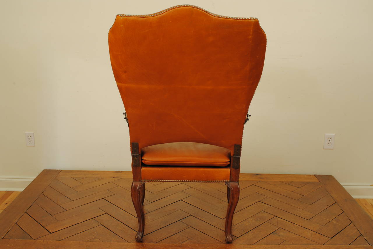 18th Century Italian Rococo Walnut and Leather Upholstered Reclining Wing Chair