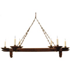 A Rustic French Pinewood and Iron 6 Light Horizontal Chandelier