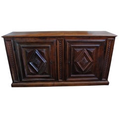 An Italian Carved Walnut Baroque Style 2-Door Credenza