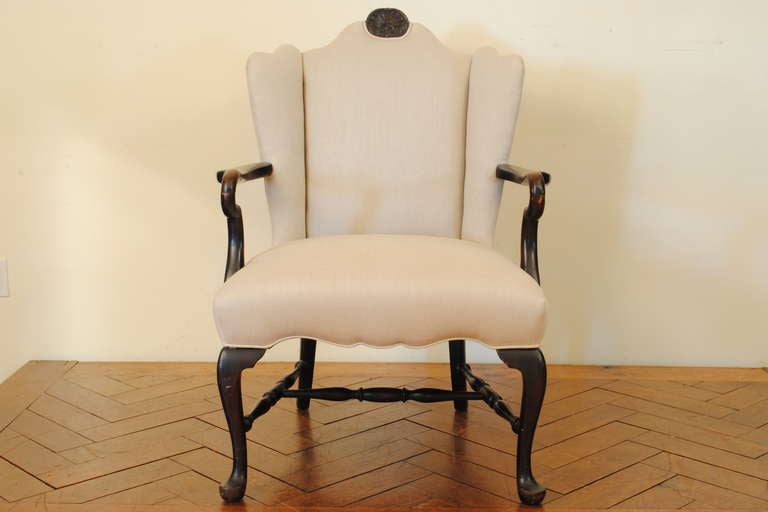 the back with small wings and center shell carving, interesting Queen Anne style arms and legs, joined by turned stretchers

Please go to www.robuck.co to see our complete inventory.