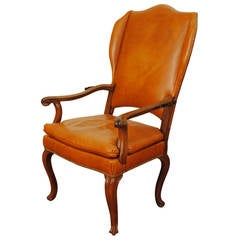 Antique Italian Rococo Walnut and Leather Upholstered Reclining Wing Chair