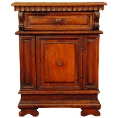 An Italian Baroque Carved and Paneled Walnut Piccolo Credenza