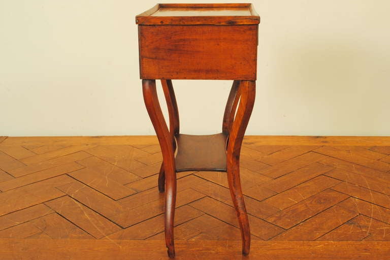 A French Late Neoclassic Walnut Two-Drawer Table from 19th Century In Good Condition In Atlanta, GA