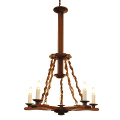 A Continental Walnut, Ebonized, and Rope 5-Light Chandelier