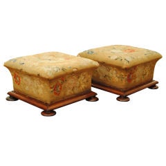A Pair of Louis Philippe Walnut & Needlepoint Covered Footstools