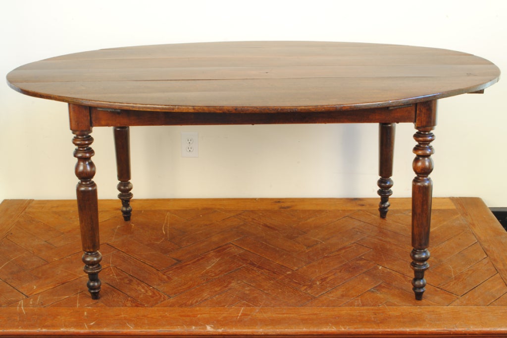 A French Louis Philippe Walnut Oval Breakfast / Dining Table