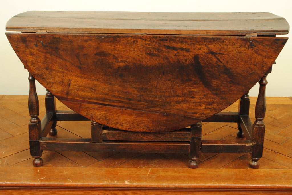 A Large George II Period Turned Oak Two-Drawer Gateleg Table