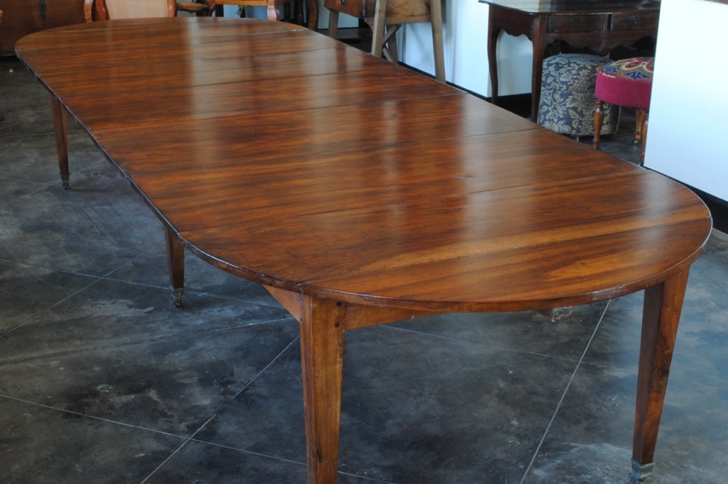A 12.5 ft French Early 19th Century Walnut Extending DiningTable