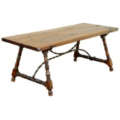 A Spanish Late Baroque Walnut Coffee Table with Iron Stretcher