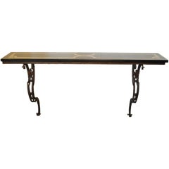 An Italian Rococo Style Gilt Iron and Marble Top Console