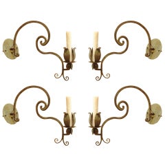A Set of 4 Italian Wrought Iron and Painted Wall Sconces