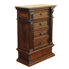An Italian Baroque Carved Walnut Piccolo Commodino