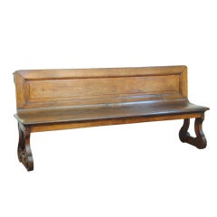An Italian Neoclassical Carved and Paneled Oak Bench