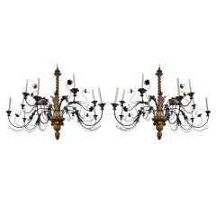 A Large Pair of Italian Baroque Giltwood 12-Light Chandeliers