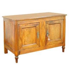 A French Walnut Directoire Period Carved and Paneled Buffet