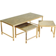 A Set of Brass and Tinted Mirrored Glass Cocktail Tables