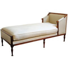 A French Directoire Period Walnut and Elm Chaise Longue