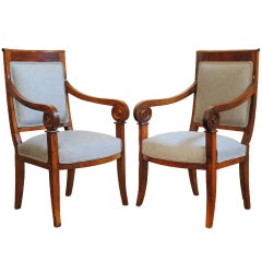 A Pair of French Cherrywood Restauration Period Walnut Fauteuils