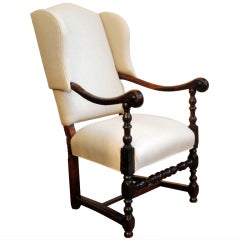 French Walnut and Upholstered Louis XIII Period Winged Fauteuil