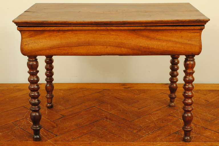A French Louis Philippe Walnut 1-Drawer Table with Turned Legs