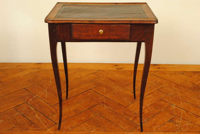 A Provincial Louis XV Stained Walnut and Leather Top Side Table, 18th Century