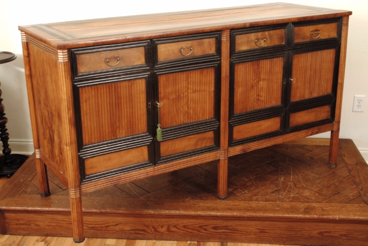 Extraordinary and rare, a one of a kind design from the late first quarter 19th century, circa 1820-1825, and having a uniquely Asian influence, the rectangular top with a double band of inlaid ebony wood above a conforming case housing two drawers