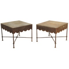 A Pair of French Wrought Iron and Scalloped Metal End Tables