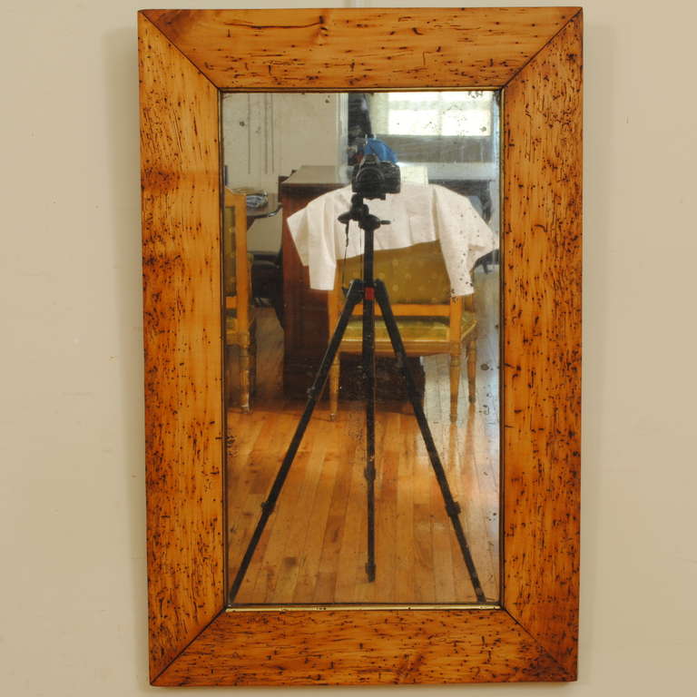 frame constructed of light walnut, the inner band trimmed in brass, retaining antique mirrorplate

Please go to www.robuck.co to see our complete inventory.