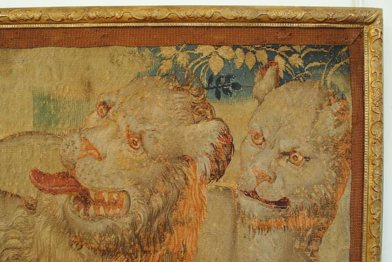 the framed fragment depicting a male and female lion in a foliate ground, frame of a later date