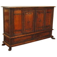 An Italian Early Baroque Period, early 17th cen Carved Walnut 2-Door Credenza