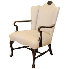Vintage Shaped and Carved Mahogany Wingchair
