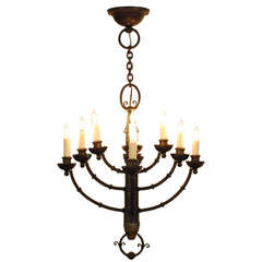 A French Neoclassical Style Cast Brass 12-Arm Chandelier