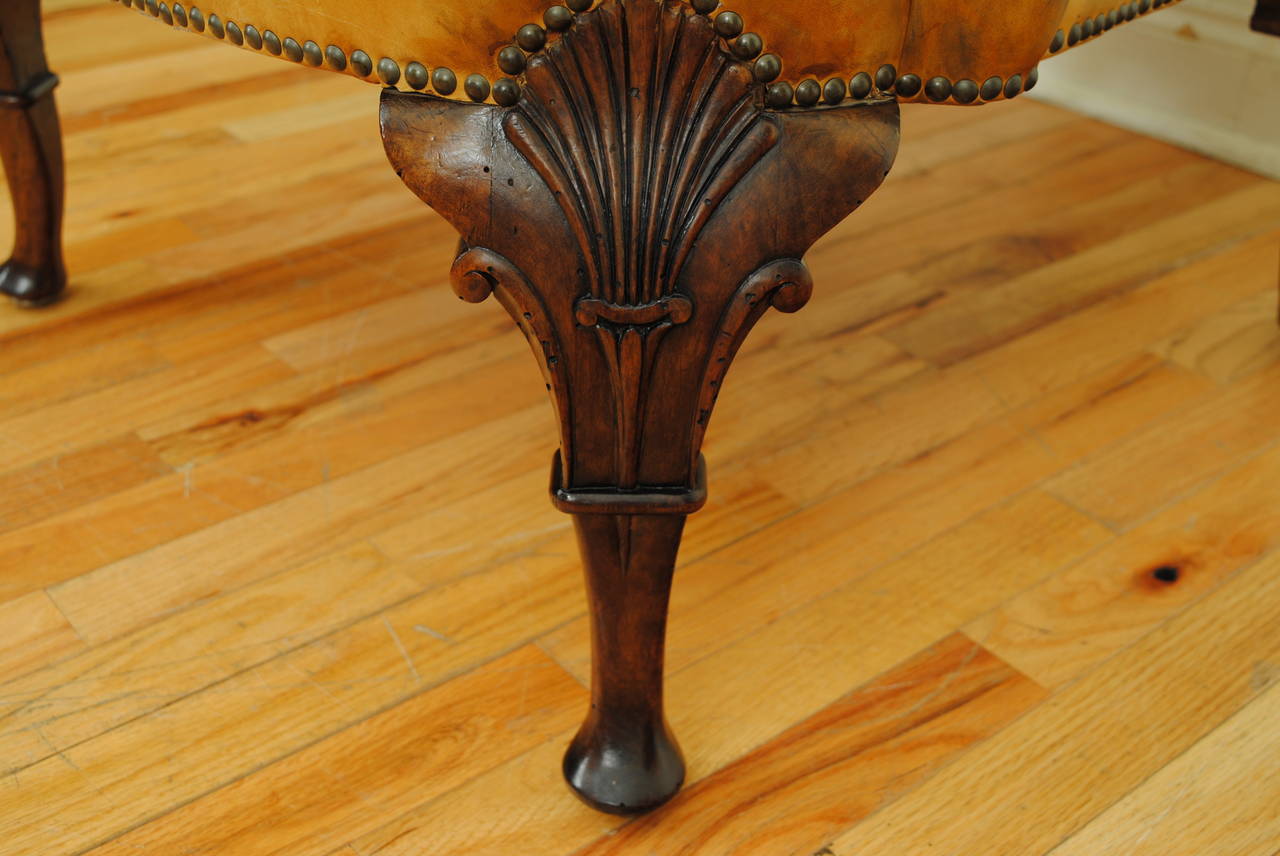 Mid-20th Century Carved Walnut Georgian Style Leather Upholstered Wing Chair