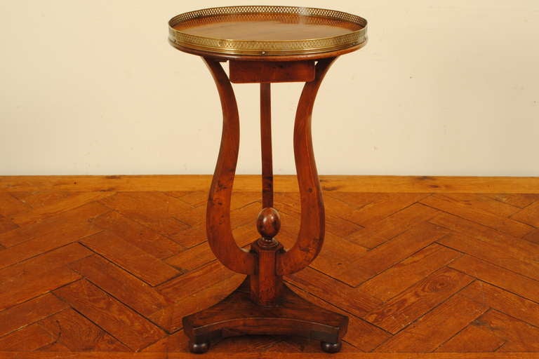 A Mid 19th Century French Neoclassic Walnut and Brass Mounted 1-Drawer Table