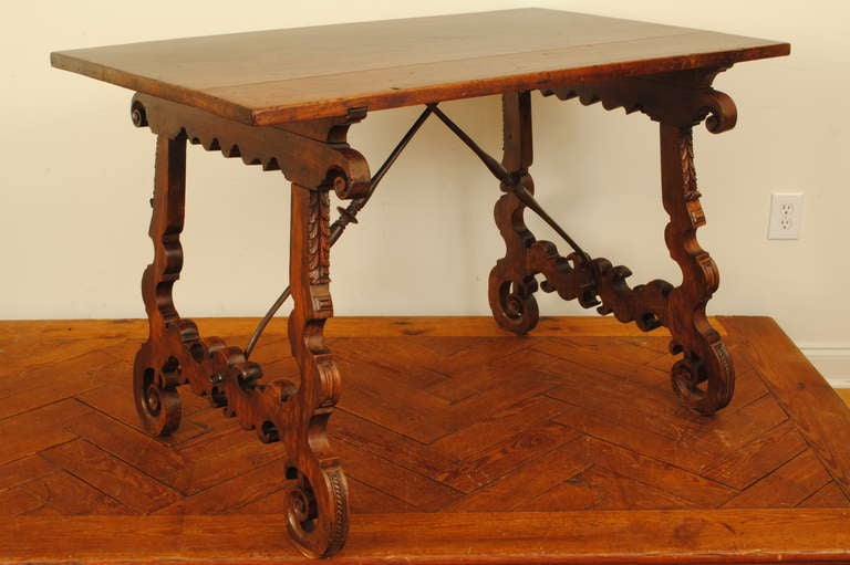 A 17th Century Spanish Baroque Carved Walnut and Iron Center Table