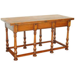 An English Elmwood 8-Leg Folding Table