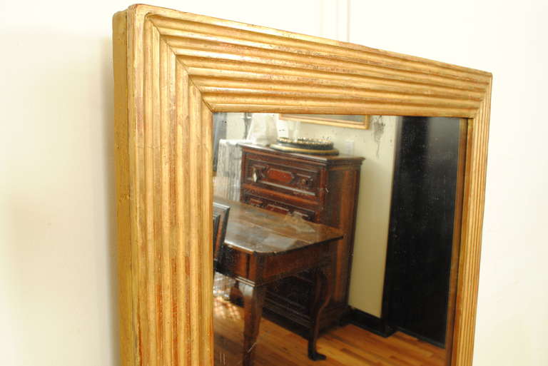 French Neoclassic Tall Fluted Giltwood and Gesso Mirror, 19th Century In Excellent Condition In Atlanta, GA