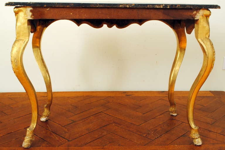 A Florentine Rococo Carved Giltwood and Faux Marble Console Table In Excellent Condition In Atlanta, GA