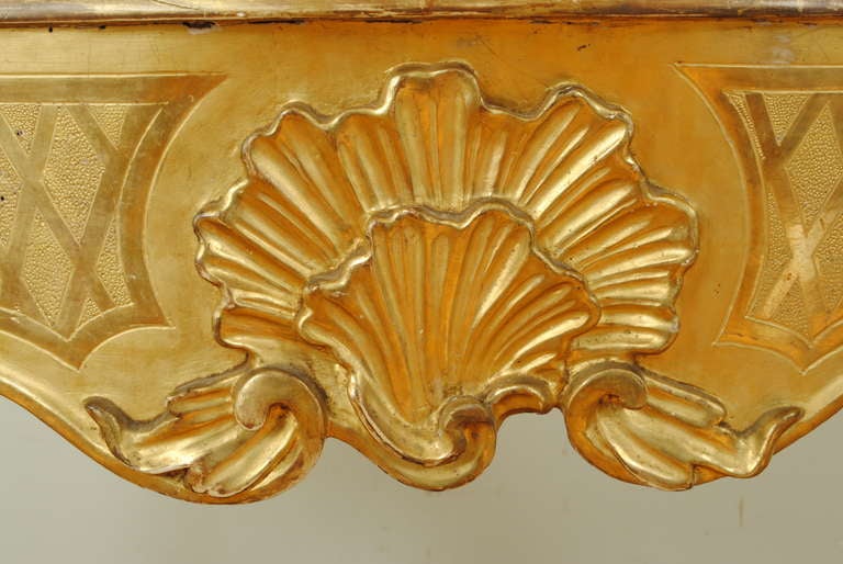A Florentine Rococo Carved Giltwood and Faux Marble Console Table 2
