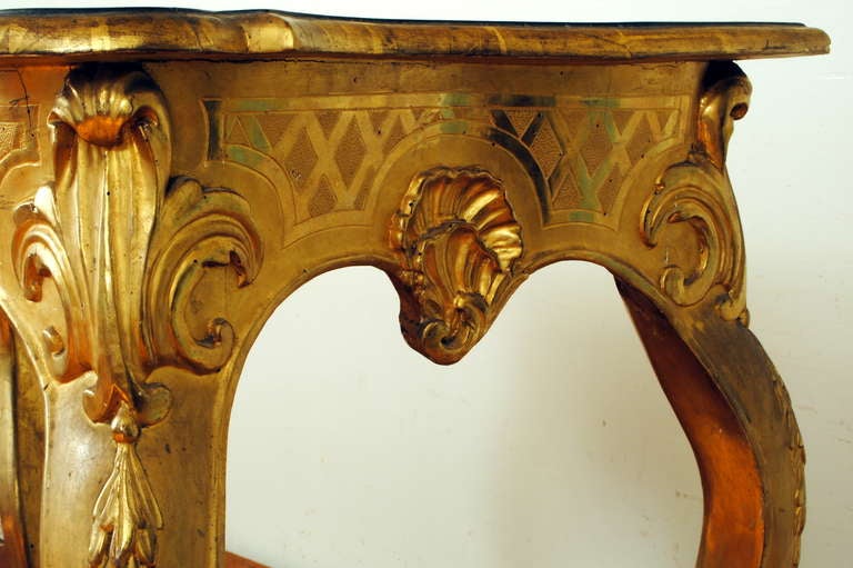A Florentine Rococo Carved Giltwood and Faux Marble Console Table 4