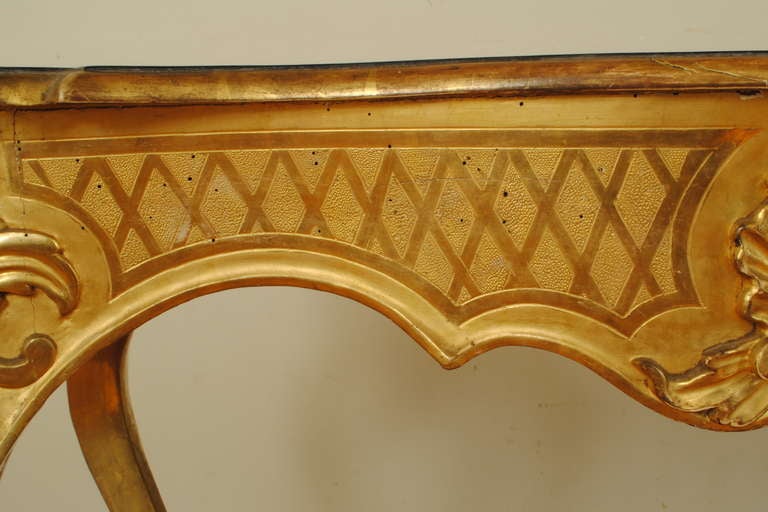 A Florentine Rococo Carved Giltwood and Faux Marble Console Table 3