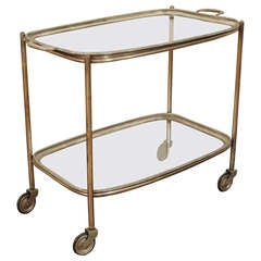 An Italian Silver Plate and Glass Wheeled Cart, Removable Trays