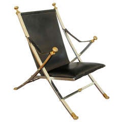 A Steel and Brass Folding Chair, Attributed to Maison Jansen