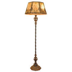 An Arts and Crafts Painted Iron and Metal Floor Lamp with Original Shade